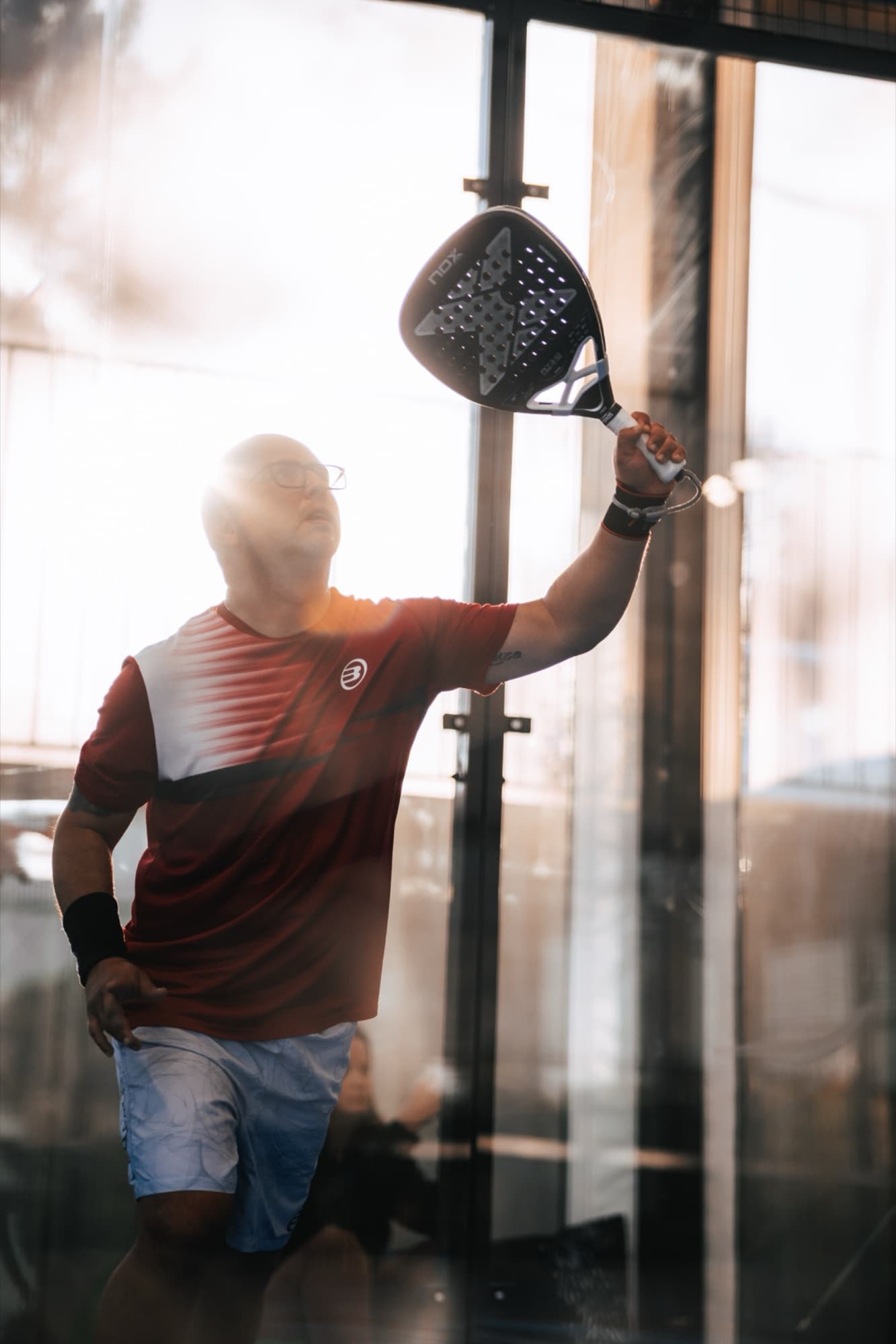 Smash mid-rally at Peru Padel